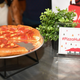 Illustration for article titled You can cheat Domino’s app to get free pizza by taking photos of photos of pizzaem/em
